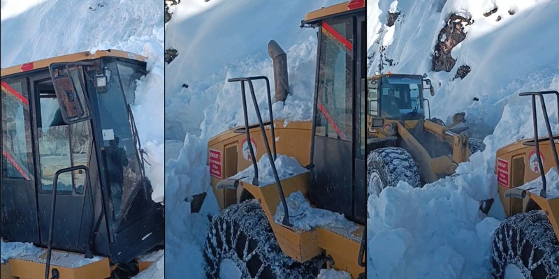 İş makinesinin üzerine çığ düştü, operatör son anda kurtuldu